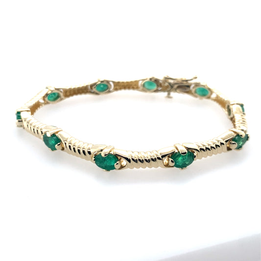 Estate 14K Yellow Gold Emerald Tennis Bracelet With Design