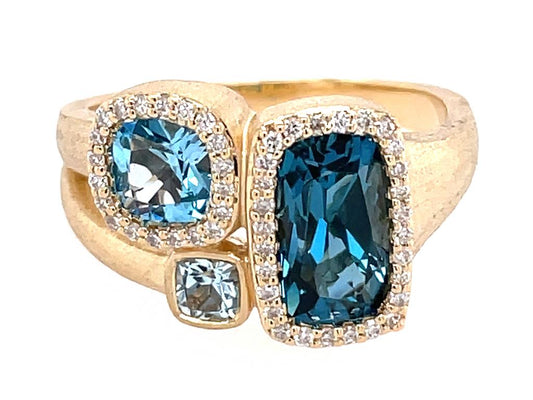 14Ky Blue Topaz & Halo Diamond Ring